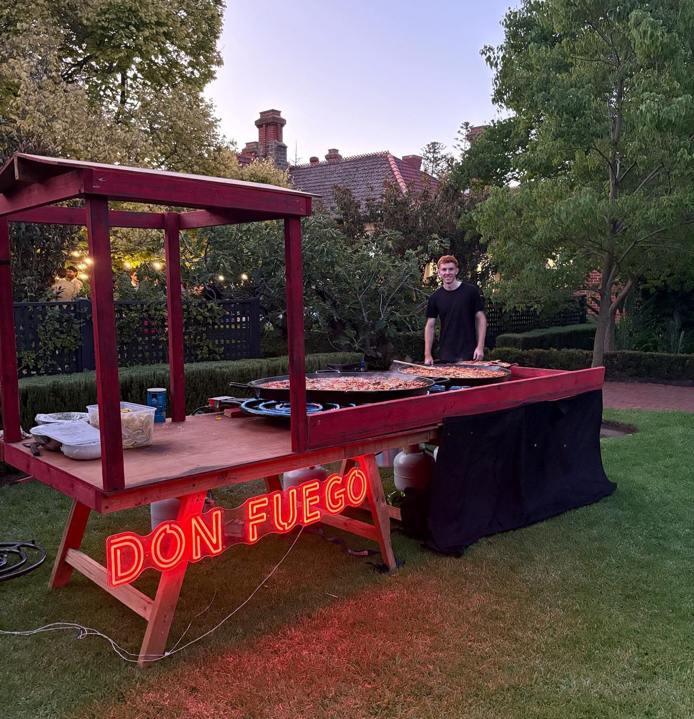 Don Fuego paella station set up at dusk