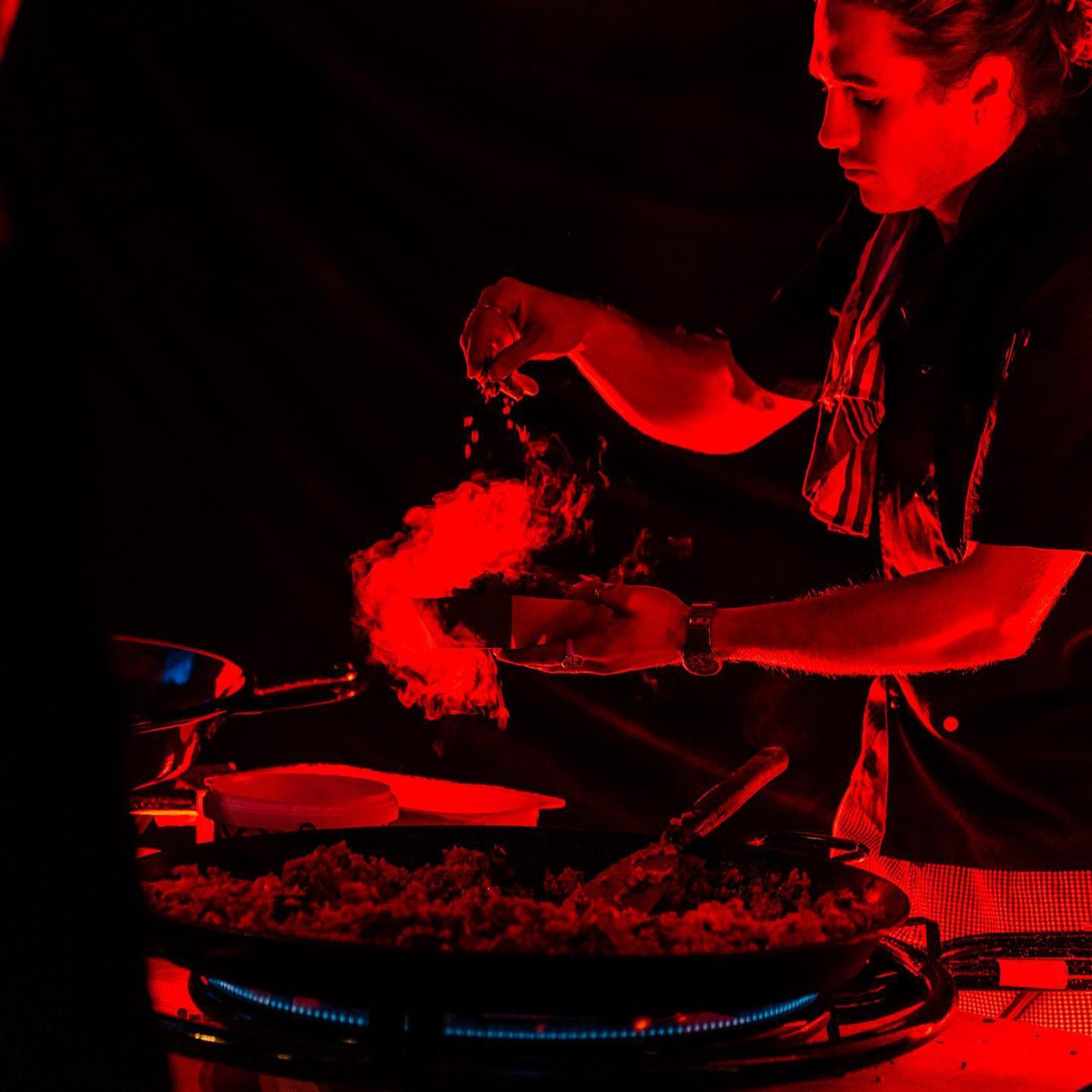 Paella cooked fresh on-site with steam rising